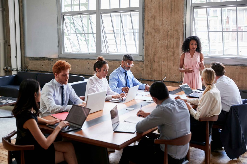 woman leading business meeting